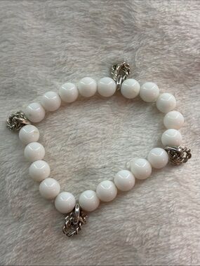 White Beaded Stretch Bracelet with Silver Knot Accents